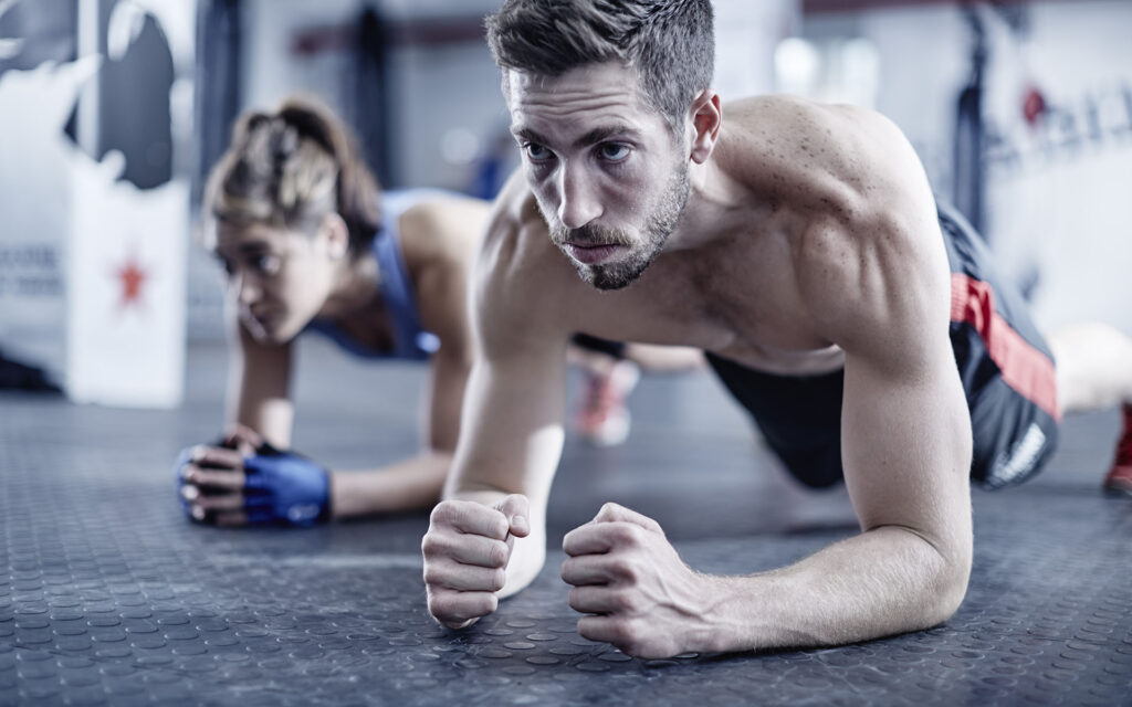 Man and woman doing fitness training